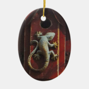 grey lizard on worn wood ceramic ornament