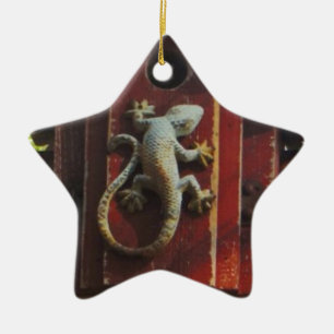grey lizard on worn wood ceramic ornament