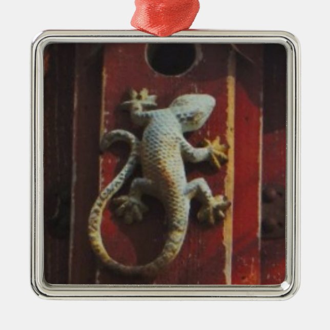 grey lizard on worn wood metal ornament (Front)