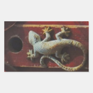 grey lizard on worn wood sticker