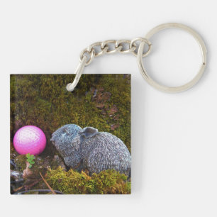 Grey rabbit / bunny and pink golf ball keychain