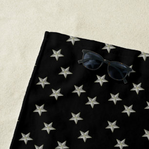 Grey stars pattern on black beach towel