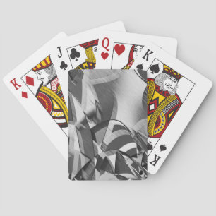 Grey streaks on some black, drizzled image playing cards