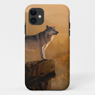 Grey wolf standing on a rock in the forest iPhone 11 case