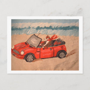 Greyhound in red  convertible car at the Beach Postcard