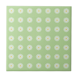 Grid pattern of tiny daisies on light green tile