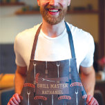 Grill Master Brown Sausage Grilling Fork Name Apron<br><div class="desc">This cool and modern pattern is perfect for the grilling master. It features a hand-drawn brown, tan, silver, black, and dark gold sausage with a grill fork cartoon illustration pattern on top of a chocolate brown abstract pattern. This design also features the phrase, "Grill Master, " with a monogram name....</div>