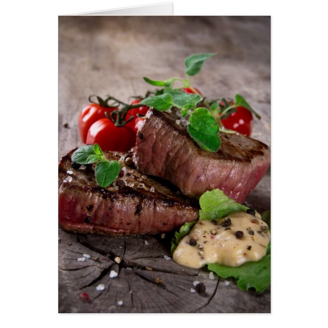 Grilled bbq steaks with fresh herbs and tomatoes (Front)