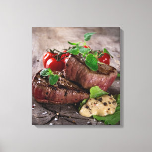 Grilled bbq steaks with fresh herbs and tomatoes canvas print