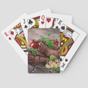 Grilled bbq steaks with fresh herbs and tomatoes playing cards