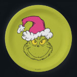 Grinch in Pink Santa Hat Paper Plate<br><div class="desc">This fantastic, bold illustration is a close-up portrait of the Grinch in full mischievous mode! He has his signature sly grin and bright yellow eyes, but his look is updated with a large, fluffy Santa hat in a fun, unexpected pink/fuchsia color instead of the traditional red. This graphic is perfect...</div>