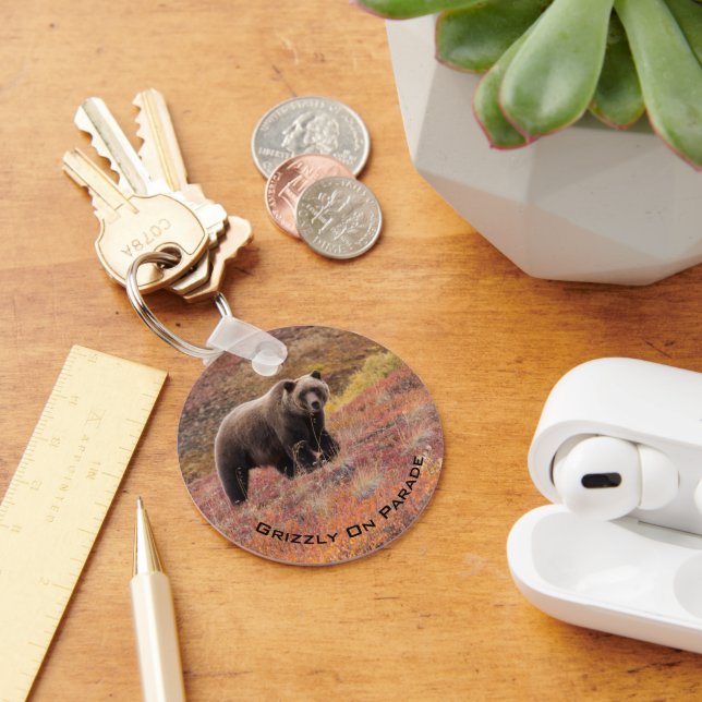 Grizzly Bear Moves Through Autumn Colours In Keychain (Desk)