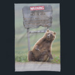 Grizzly Bear Plays With Sign Kitchen Towel<br><div class="desc">Grizzly bear scratches a roadside sign in Sable Pass,  Denali National Park,  Alaska</div>