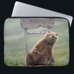 Grizzly Bear Plays With Sign Laptop Sleeve<br><div class="desc">Grizzly bear scratches a roadside sign in Sable Pass,  Denali National Park,  Alaska</div>