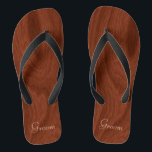 Groom Wedding Day Rustic Wood Look Beach Honeymoon Flip Flops<br><div class="desc">Rustic wood look groom thong sandals flip flops perfect for beach weddings- Reads Groom in elegant, pastel lettering at the bottom. Elegant, rich mahogany woodgrain pattern look background. Note: Wood is printed image. Rustic wedding favours for bridal party members. Just change text templates to create your own personalized wedding party...</div>