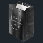 Groomsman Black Brushed Metal Medium Gift Bag<br><div class="desc">Thank your groomsmen with this brushed metal design featuring bold typography. Personalize this design with your groomsman name and wedding date. Makes a great gift bag.</div>