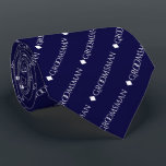 Groomsman Repeating White Text on Navy Blue Tie<br><div class="desc">This fun neck tie is the perfect accessory for the groomsmen at your wedding. It features a simple yet elegant design with the word "groomsman" written in fancy all capital white text repeating in a diagonal pattern on a navy blue background. Perfect way to add a bit of class to...</div>