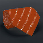 Groomsman Repeating White Text on Rust Orange Tie<br><div class="desc">This fun neck tie is the perfect accessory for the groomsmen at your wedding. It features a simple yet elegant design with the word "groomsman" written in fancy all capital white text repeating in a diagonal pattern on a rust orange or burnt umber coloured background. Perfect way to add a...</div>