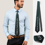 Groomsman wedding Bachelor party black Tie<br><div class="desc">This exquisite personalized tie showcases the word "groomsman" in a light grey hue against a gradient background of dark and light black. It offers a mix of humour, elegance, and style to enhance your wedding or bachelor party attire. It's a delightful way to invite your friends to be groomsmen or...</div>