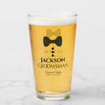 Groomsman Wedding Favour Glass Tumbler<br><div class="desc">This fun glass tumbler or tall beer glass is designed as a gift or favour for the Groomsmen at your wedding. It features an image of a black tie with three buttons. The text reads "Groomsman" and has a space for his name as well as the couple's names and wedding...</div>