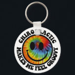 Groovy Chiropractic Keychain<br><div class="desc">This design features a tie-dyed smiley face with encircling text that reads.  "Chiropractic Makes Me Feel Groovy."</div>