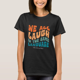 Groovy We All Laugh In The Same Language ESL Teach T-Shirt