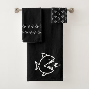 Gros poisson petit poisson noir blanc