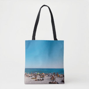 GROUP OF PEOPLE ENJOYING THE GRAY SANDED BEACH WIT TOTE BAG