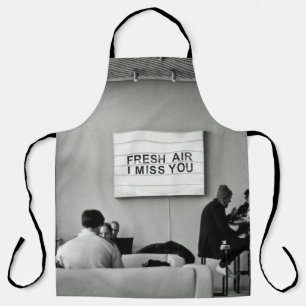 GROUP OF PEOPLE SITTING ON CHAIR APRON
