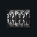 Group of Plains Zebra Drink Together at Night Canvas Print<br><div class="desc">Africa,  East Africa,  Kenya,  Great Rift Valley,  Olkirimatian Conservancy,  plains zebra,  Equus quagga.  A group of plains zebra drink together at night.  B & W</div>