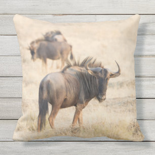 Group of wildebeest outdoor pillow