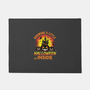 Growing a Little Halloween Inside Haunted Pumpkin Doormat