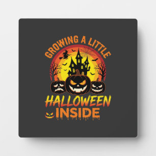 Growing a Little Halloween Inside Haunted Pumpkin Plaque