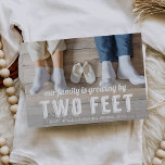Growing By Two Feet Pregnancy Announcement<br><div class="desc">Share a cute photo of your shoes next to a pair of baby shoes with this adorable pregnancy announcement. Full bleed photo card features "our family is growing by two feet" as a white text overlay along the bottom. Personalize with your names and baby's expected arrival date beneath. Cards reverse...</div>