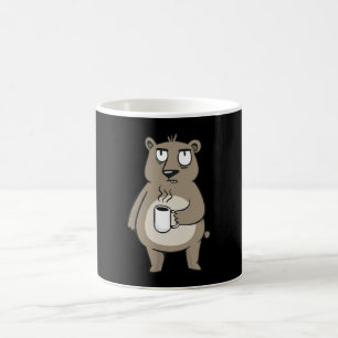 Grumpy bear holding a cup of coffee