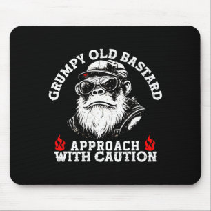 Grumpy old approach with caution monkey on back mouse pad