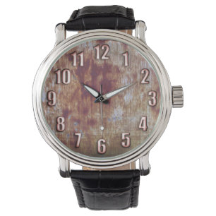 Grunge rusted metal with big bronze numbers watch
