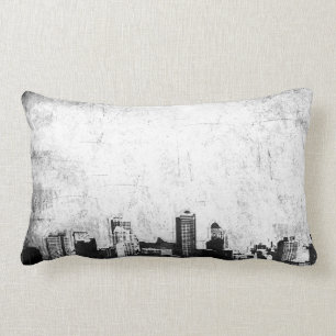 Grungy city background in black and white lumbar pillow