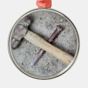 Grungy hammer and chisel metal ornament