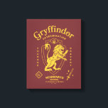 GRYFFINDOR™ Determination Courage Bravery Crest Canvas Print<br><div class="desc">Show your house pride with this bold Gryffindor™ crest design, celebrating the values that define the bravest of witches and wizards. Featuring the iconic lion standing proudly before a shield, this striking artwork highlights Gryffindor’s core traits — Courage, Determination, and Bravery — in a powerful, vintage-inspired layout. The rich house...</div>
