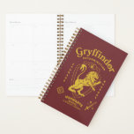 GRYFFINDOR™ Determination Courage Bravery Crest Planner<br><div class="desc">Show your house pride with this bold Gryffindor™ crest design, celebrating the values that define the bravest of witches and wizards. Featuring the iconic lion standing proudly before a shield, this striking artwork highlights Gryffindor’s core traits — Courage, Determination, and Bravery — in a powerful, vintage-inspired layout. The rich house...</div>