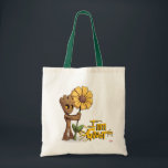 Guardians of the Galaxy | Baby Groot & Daisy Tote Bag<br><div class="desc">Check out Baby Groot standing next to a yellow daisy, holding onto the stem. Personalize your Baby Groot gear by clicking the customize button to get started! Add your own caption or name by adding text, or resize the image to focus on your favorite part!</div>