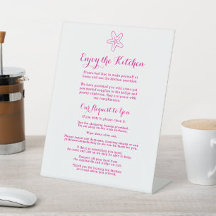 Guest enjoy the kitchen starfish beach house pink pedestal sign