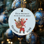 Gun Lover Santa Deck the halls Monogram Name Ceramic Ornament<br><div class="desc">This design may be personalized in the area provided by changing the photo and/or text. Or it can be customized by clicking Personalize this Template and then choosing the click to customize further option and delete or change the color of the background, add text, change the text color or style,...</div>