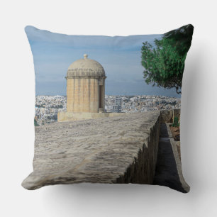 Gun turret on old city walls in Valletta, Malta Throw Pillow