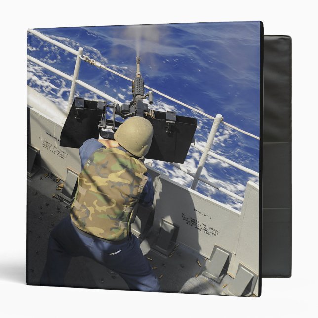 Gunners Mate firing a 50 calibre machine gun Binder (Front/Inside)