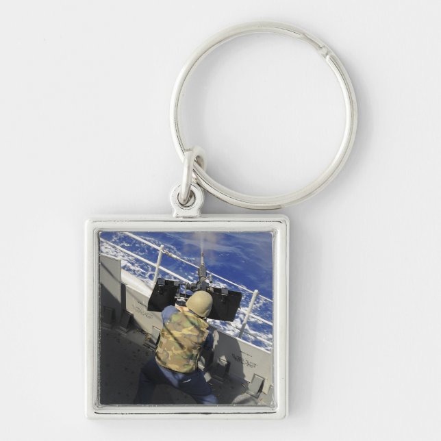 Gunners Mate firing a 50 calibre machine gun Keychain (Front)