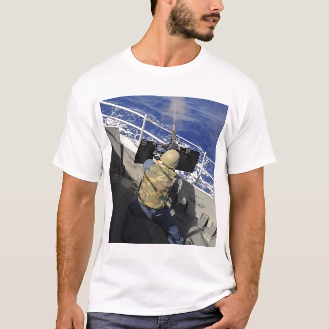Gunners Mate firing a 50 calibre machine gun T-Shirt (Front)