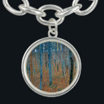 Gustav Klimt Beech Tree Forest Grove Bracelet<br><div class="desc">This is based on classic nature painting artworks by Gustav Klimt, Beech Grove 1, 1902. The artwork portrays a dense forest of tall, slender birch trees, with pale trunks marked by dark, vertical lines. The foliage is depicted in shades of blue, green, and yellow, adding a sense of depth and...</div>