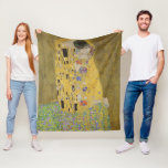 Gustav Klimt The Kiss Classic Painting Fleece Blanket<br><div class="desc">Gustav Klimt's "The Kiss" is undoubtedly one of the most iconic and revered paintings of the early 20th century, epitomizing the Art Nouveau movement with its intricate details and gold leaf accents. The artwork depicts a loving couple, a man and a woman, locked in a tender kiss against a backdrop...</div>